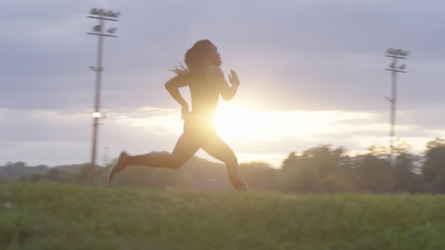 Person running at sunrise